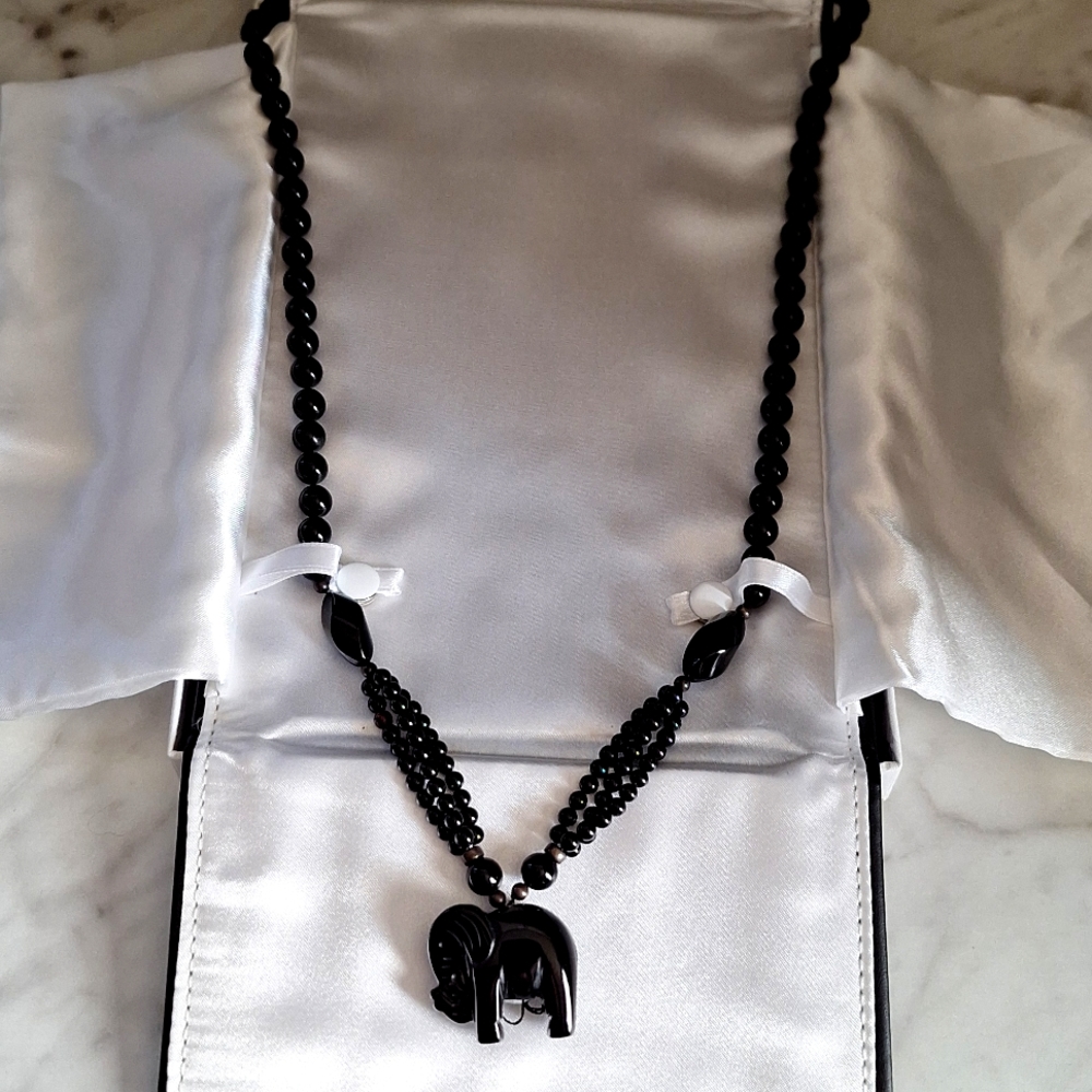 Women's black onyx elephant necklace.